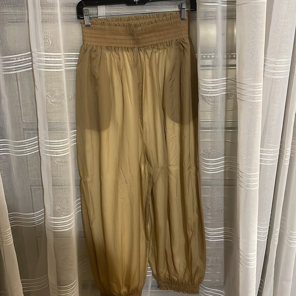 FP movement gold pants worn once for a few hours also in bronze